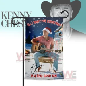Alt text: A Christmas flag with Kenny Chesney in a pink shirt, sitting on snow with a guitar and wearing a Santa hat.