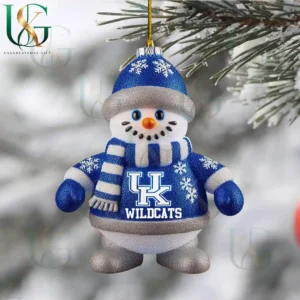 Kentucky Wildcats snowman ornament wearing blue sweater with team logo hanging from snowy Christmas tree!
