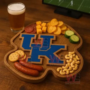 A wooden platter with a blue UK design surrounded by assorted snacks sits near a glass of beer with a sports game on a television!
