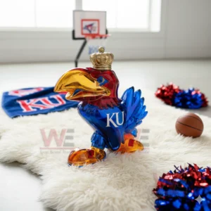 Jayhawk KU bottle with gold crown on white rug with basketball and pom poms!