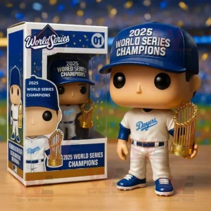Funko Pop figure in Doyers uniform holding gold trophy with 2025 World Series Champions text and its display box on wooden surface!