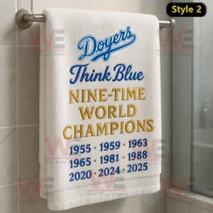 Los Angeles Dodgers 2025 World Series Champions Towel 3 White towel with Doyers Think Blue Nine Time World Champions text in blue and gold with championship years listed below!```