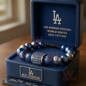 A commemorative bracelet for the Los Angeles Dodgers 2025 World Series win presented in a blue case with silver and blue beads and engraved championship text!