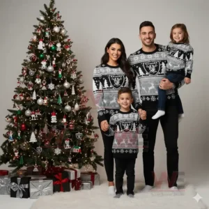 Las Vegas Raiders NFL Christmas Ugly Sweater 2025 4 Family in matching black and gray Raiders Christmas sweaters standing beside a Christmas tree decorated with lights and ornaments!