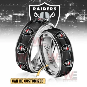 Two polished rings featuring raiders symbols in festive hats displayed before a large team logo background!