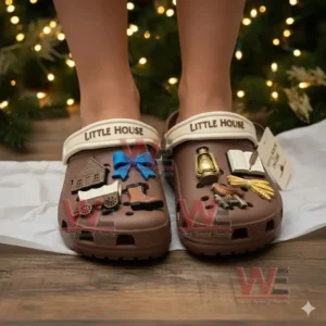 Brown charm decorated clogs worn by a person in a festive environment!