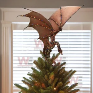 Lord of The Rings Christmas Tree Topper With Ornament 13 A dragon tree topper with wide wings decorated with colorful lights on a Christmas tree.