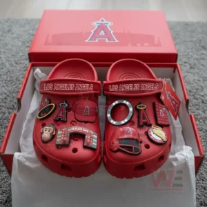 Red Los Angeles Angels Crocs with baseball-related charms inside a red team-branded box.