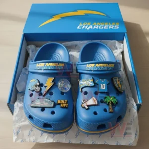 Los Angeles Chargers Crocs inside a blue box with football and team-themed charms.