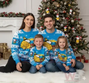 Alt text: Family of four wearing matching Los Angeles Chargers Snoopy Christmas sweaters sitting by a Christmas tree.