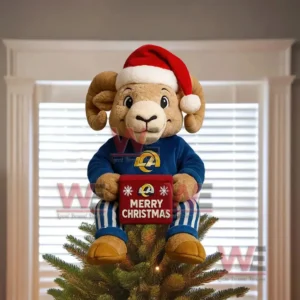 A decorative Los Angeles Rams Christmas ornament featuring a football player in Santa costume positioned in a snowy holiday landscape.