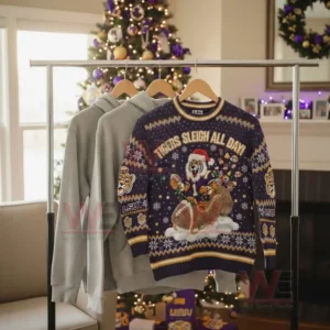 A Christmas sweater with LSU Tigers theme featuring a tiger in a Santa hat riding a sleigh.