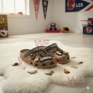 Alt text: Beige Crocs decorated with various music-themed charms on a fluffy rug in a sports-themed room.