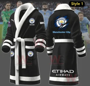 Black Manchester City themed bathrobe shown with players in a stadium!