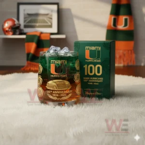 A close view of a green Miami Hurricanes anniversary glass with ice next to a matching box in a decorated sports room!