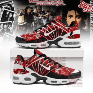 A close-up of a person wearing Michael Jackson-themed sneakers with red, black, and white graphics inspired by his 