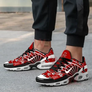 A back view of sneakers with Michael Jackson-themed red and black graphics.