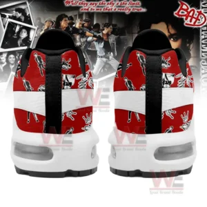 A pair of Michael Jackson-themed sneakers in a shoe box with red and black graphics.