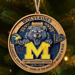 Michigan Wolverines 146th Anniversary Edition Christmas ornament hanging on tree with blue and yellow design!