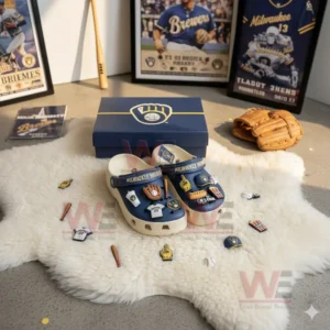 Milwaukee Brewers Crocs Crocband Clogs With Charms 6 Alt text: Milwaukee Brewers-themed Crocs with baseball charms on a white rug with memorabilia and a glove.
