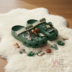 Milwaukee Bucks-themed Crocs decorated with basketball-related charms.
