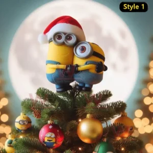 Two Minions sitting on a Christmas tree hugging each other with a full moon and festive lights in the background.