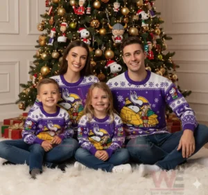Alt text: Family of four wearing matching purple Minnesota Vikings Snoopy Christmas sweaters in front of a Christmas tree.