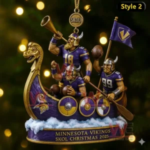 A Minnesota Vikings Christmas ornament showing Viking football players on a ship with numbers 18 and 99 and the Skol Christmas 2025 label.