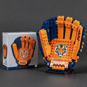 Brick model of an orange and blue baseball glove with a tiger emblem positioned next to its matching box.