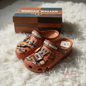 Morgan Wallen Crocs with Charms 6 Morgan Wallen themed Crocs with decorative charms and branded box placed on a fluffy white surface!