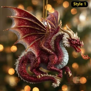 A red dragon ornament with sparkling wings suspended before warm holiday lights!