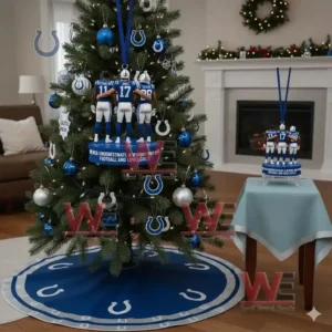 Alt text: An Indianapolis Colts-themed Christmas tree with team ornaments and player figurines displayed on a nearby table.