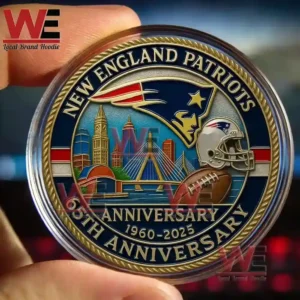 Commemorative coin with New England Patriots graphics including team emblem cityscape football and helmet!