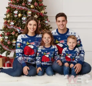 Alt text: Family of four wearing matching New England Patriots Snoopy-themed Christmas sweaters in front of a decorated Christmas tree.