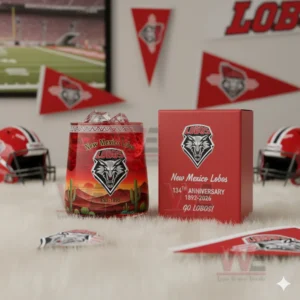 New Mexico Lobos anniversary glass with ice on a rug in a sports decorated room!