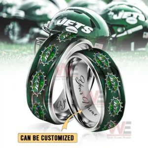 Two polished rings with jets symbols wrapped in festive lights shown in front of a large team helmet background!