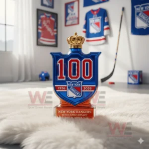 A crown topped one hundred year New York Rangers bottle sits on a white rug in a hockey themed room!