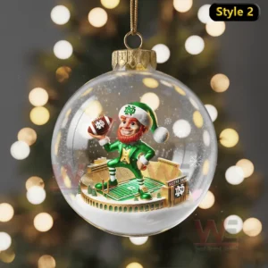Notre Dame Fighting Irish Christmas Ornament 9 An ornament showing the Notre Dame mascot in a football pose with snow and the team logo, perfect for Fighting Irish fans.