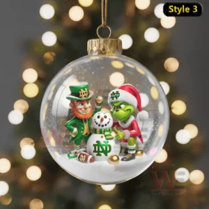 Notre Dame Fighting Irish Christmas Ornament 10 An ornament featuring the Notre Dame mascot, a Grinch-like character, and a snowman in festive attire, spreading holiday cheer.