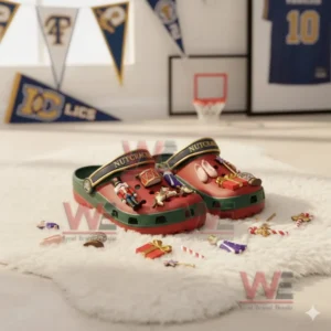 Nutcracker Premium Crocs Croband Clogs with Charms 6 Nutcracker themed clogs with assorted holiday charms scattered around them on a white surface.!