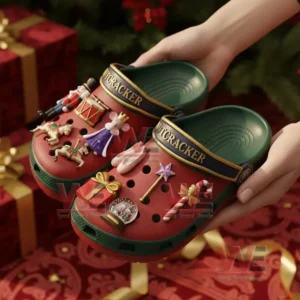 Nutcracker Premium Crocs Croband Clogs with Charms 7 A pair of Nutcracker themed clogs held before Christmas decorations and presents.!