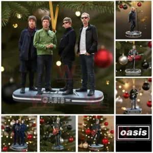 Four band members stand on a round ornament hanging on a Christmas tree with several smaller character ornaments arranged nearby.