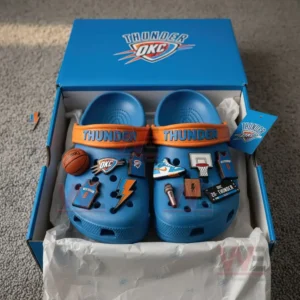 Oklahoma City Thunder Crocs inside packaging box with basketball-related charms.