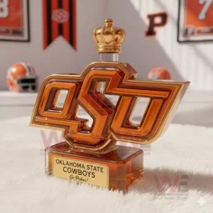 An OSU themed bottle with a crown cap sits on a white rug in a bright Oklahoma State room!