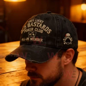 Man wearing black distressed cap with poker themed embroidery.