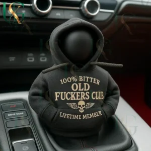 Mini hoodie covering a car gear shift with a funny slogan and skull emblem inside a modern car interior!