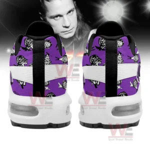 A back view of Ozzy Osbourne-themed sneakers with purple and black designs, featuring bats and skulls.