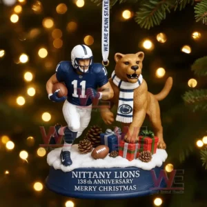 Penn State Nittany Lions 138th Anniversary Christmas ornament featuring football player and lion mascot on snowy decorated base!