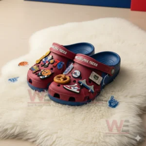Philadelphia 76ers-themed Crocs decorated with basketball-related charms.