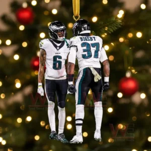 Philadelphia Eagles ornament with two players in team uniforms hanging on a Christmas tree.